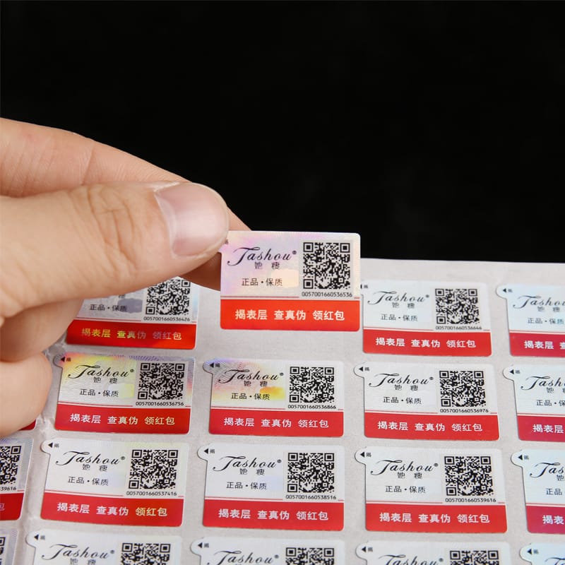 Peel and reveal anti-counterfeit QR code labels