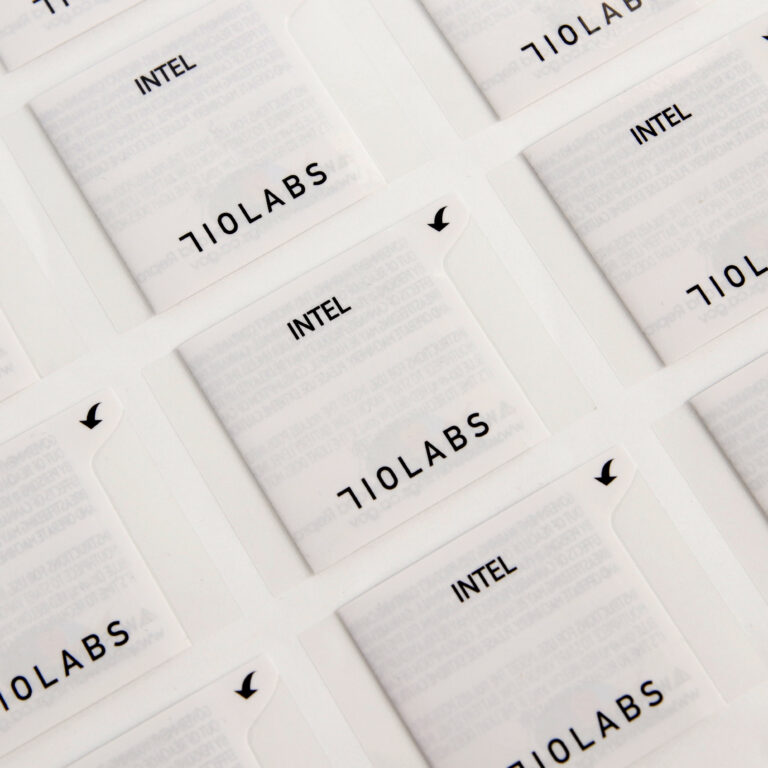 Compliance symbols printed on extended content booklet label