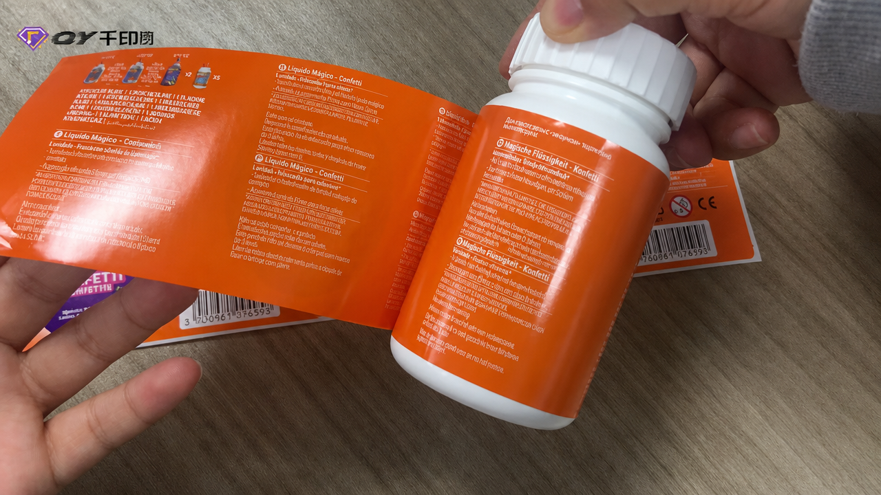 Real multi-layer label footage showing an opened label fitted to a package
